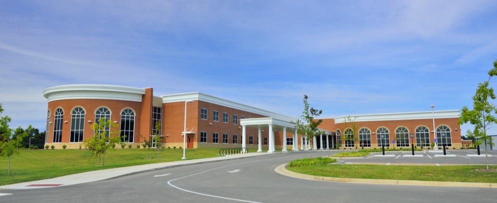 The design of the new Glasgow High School was phased around an existing classroom building, gymnasium building and separate band/vocational tech building to provide the opportunity to connect the disjointed buildings, and create a high performance, energy efficient campus worthy of LEED® certification.