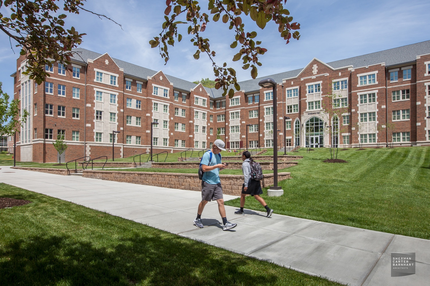 The brick and limestone exterior is designed in the collegiate gothic style to enhance the existing campus architecture.